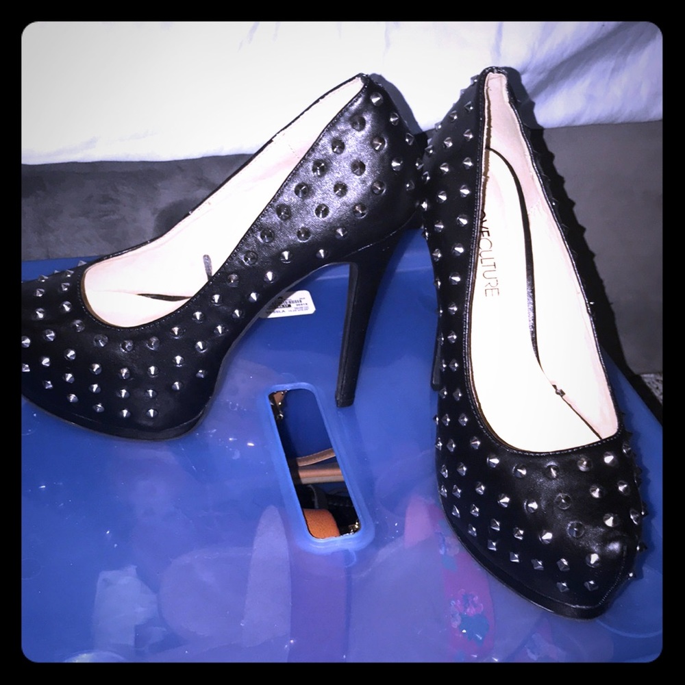 Black studded platform pumps